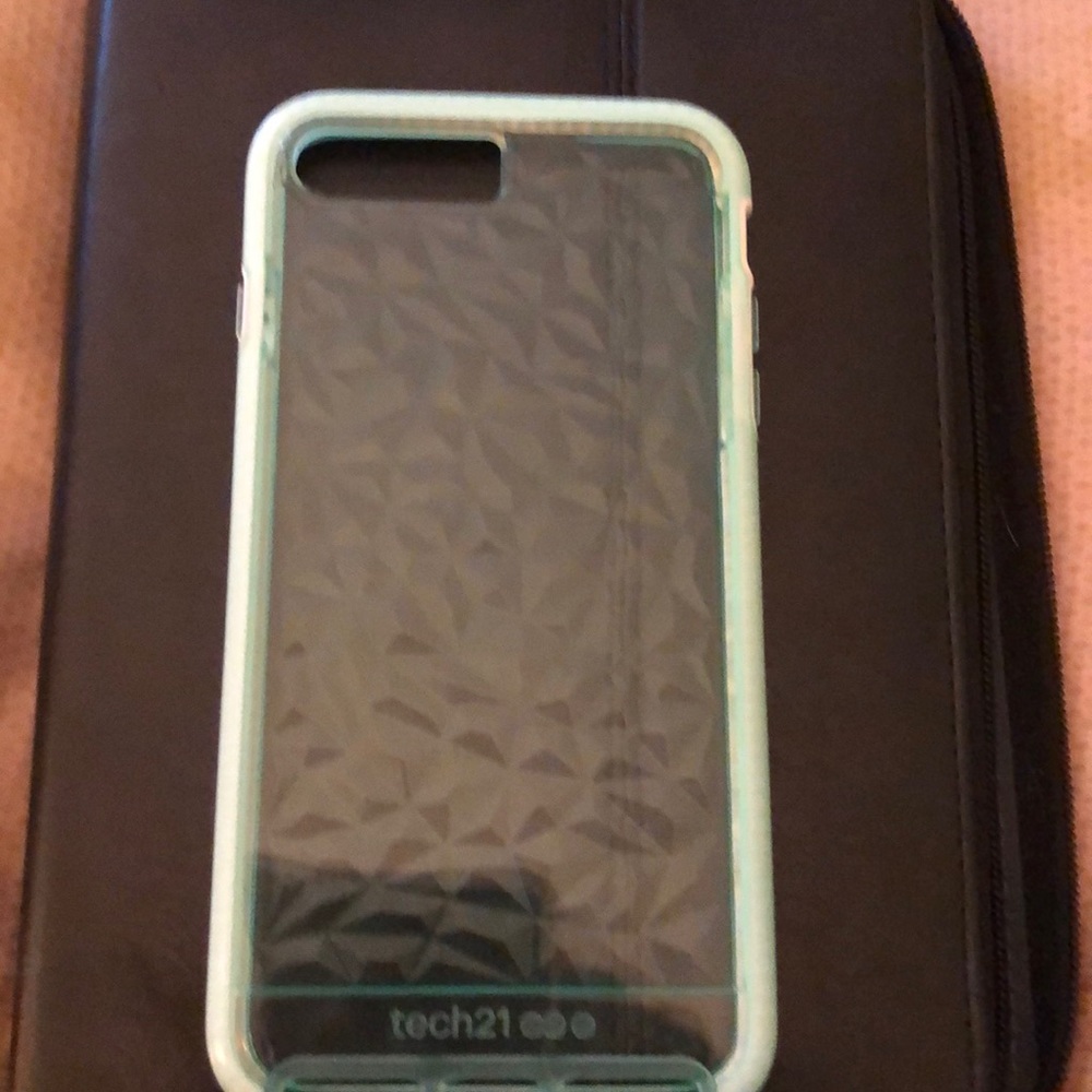 This is a mint green tech 21 Evo gem case!